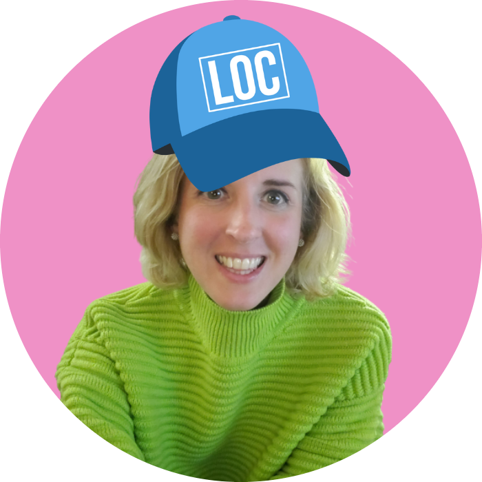 Upper body of a blond, Caucasian woman named Alaina wearing a lime green sweater and smiling, with the image of a two-toned baseball cap in blue with the phrase LOC in white lettering on the crown positioned on her head on a pink background